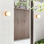 Caliror Round-Plate Travertine Wall Light