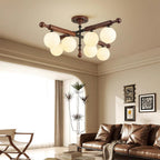 Briette Ceiling Light Wood Arms Sculptural Globe