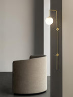 Nyvaris Modern Minimalist Globe Brass Glass Sconce Wall lamp