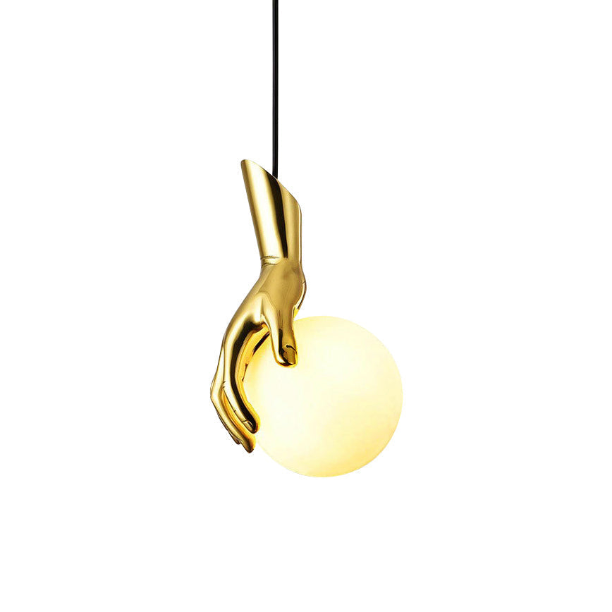 Avnorira Hand Holding Globe Brass Glass Pendant Light