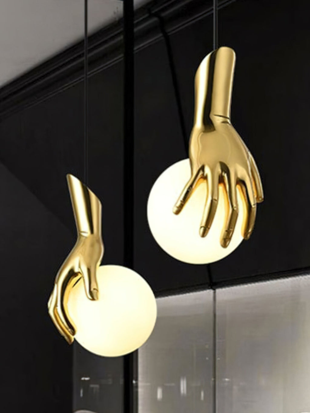 Avnorira Hand Holding Globe Brass Glass Pendant Light