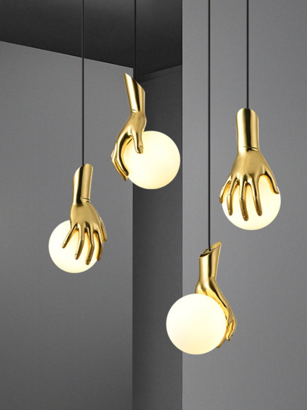 Avnorira Hand Holding Globe Brass Glass Pendant Light