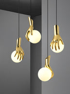 Avnorira Hand Holding Globe Brass Glass Pendant Light