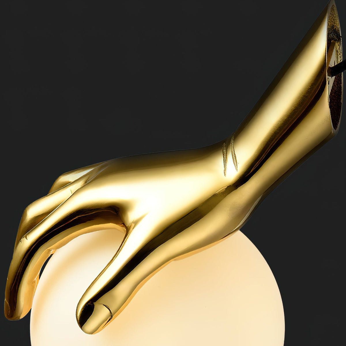 Avnorira Hand Holding Globe Brass Glass Pendant Light