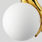 Avnorira Hand Holding Globe Brass Glass Pendant Light