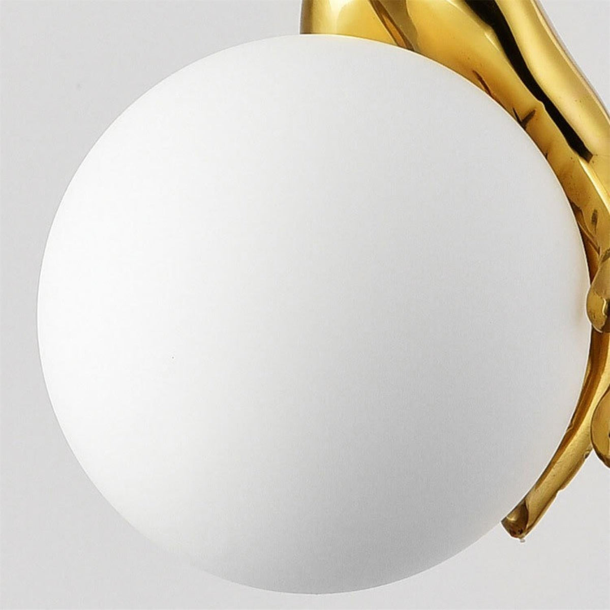Avnorira Hand Holding Globe Brass Glass Pendant Light