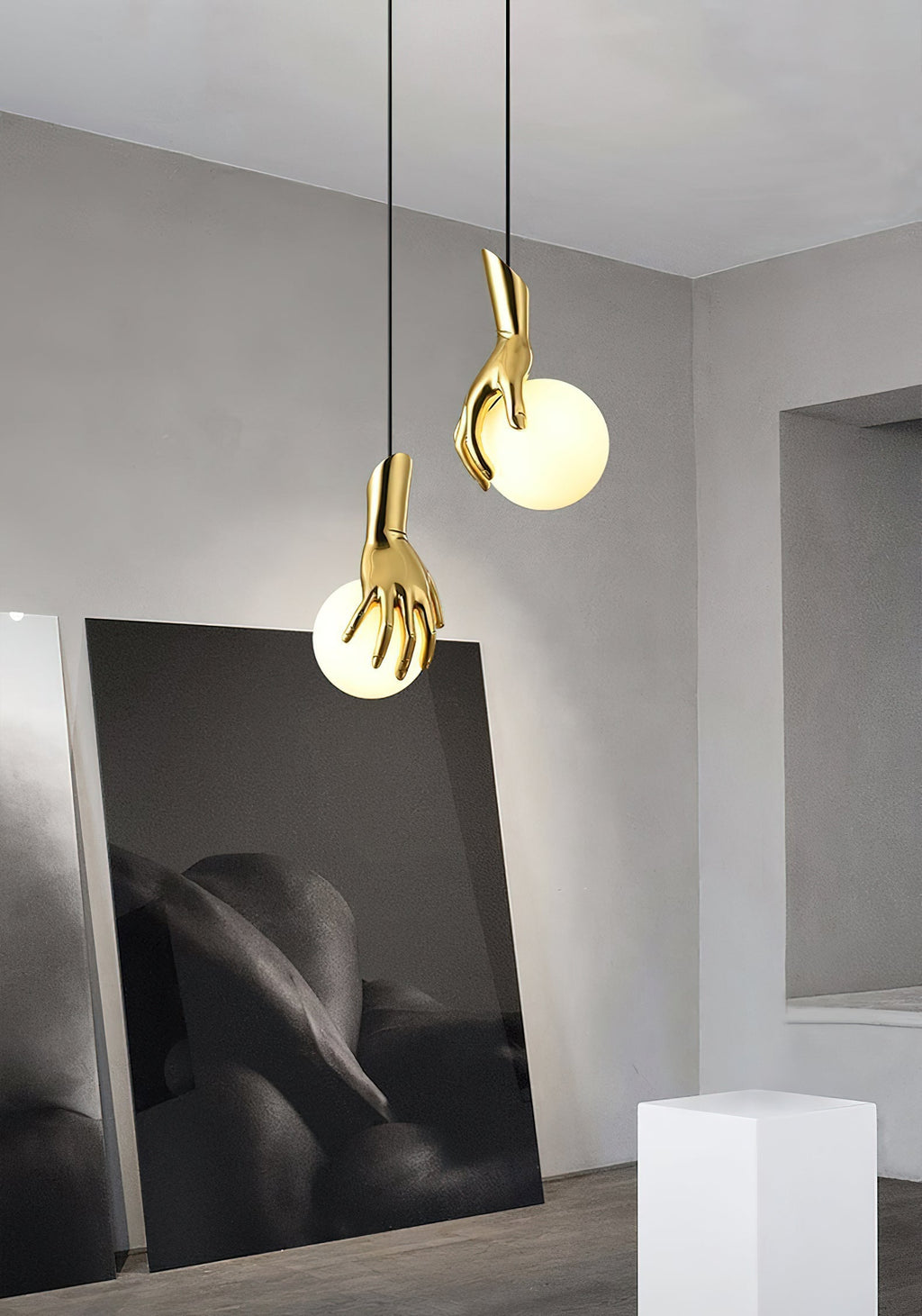 Avnorira Hand Holding Globe Brass Glass Pendant Light