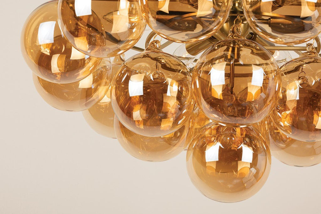 Aurora Chandelier Clear Glass Globe Aged Brass Elegant
